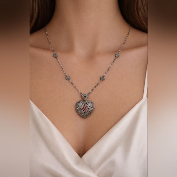 Jewelry - Silver Heart Pendant Necklace with Intricate Design.